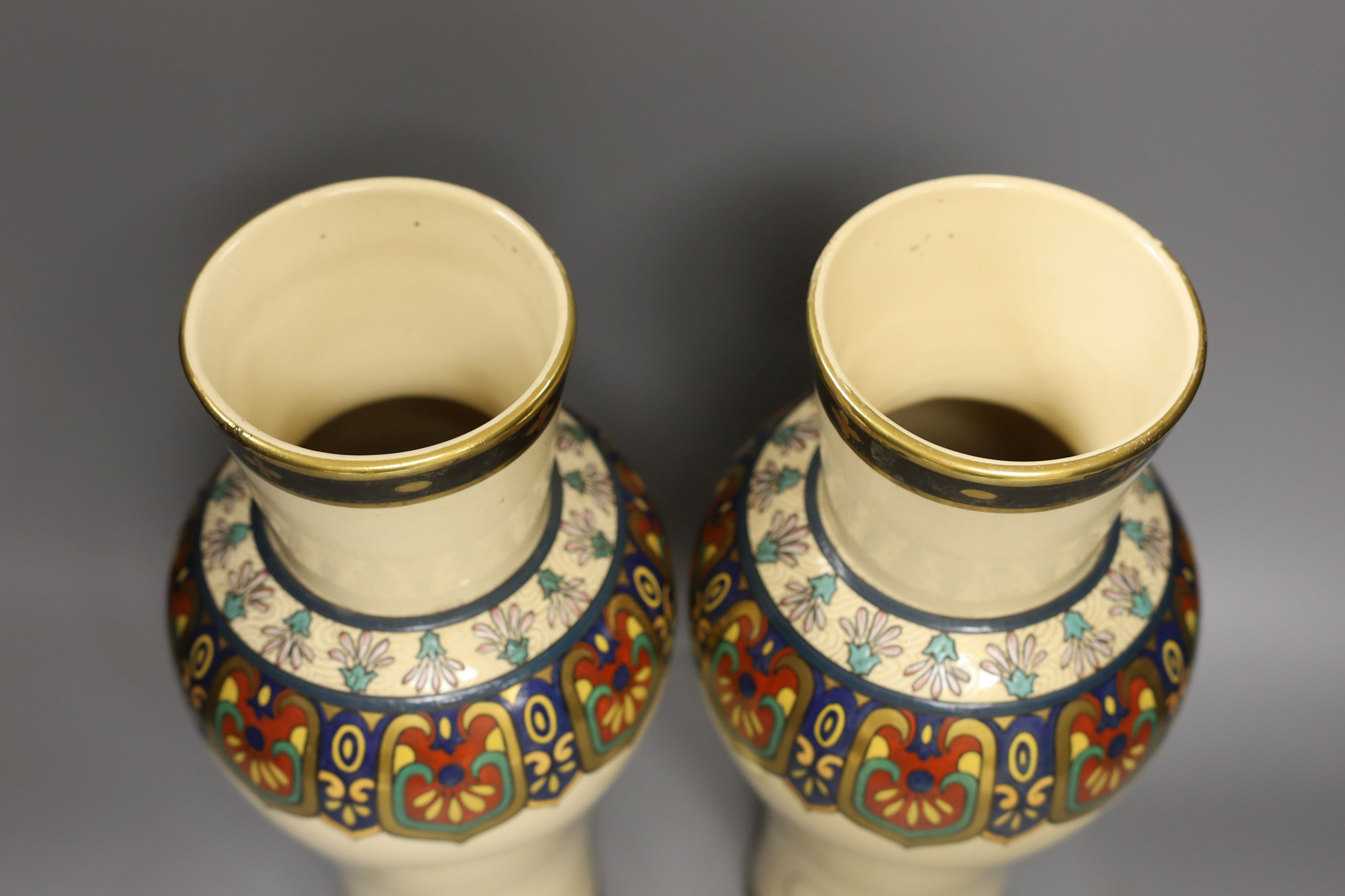 A large pair of Japonaise phoenix decorated baluster vases, 38 cms high.